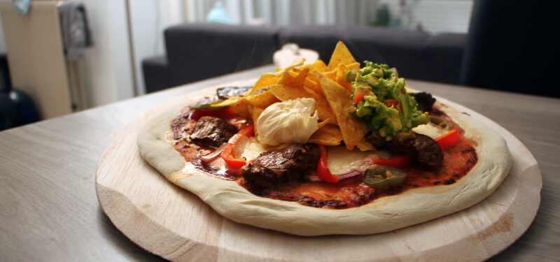 Met dit Mexicaanse Pizza recept verras je je gasten gegarandeerd!